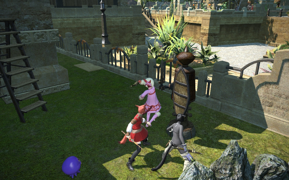 A player about to hit a striking dummy in a free company house, Final Fantasy XIV